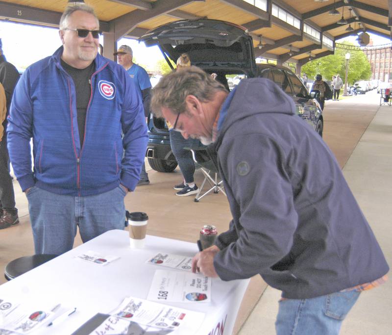 Brad Folkers of Sterling registers his '64 Plymouth for the car show. Sterling Main Street's 12th Annual Car Show took place at the Sterling Marketplace on Sunday, May 4th, 2025.
