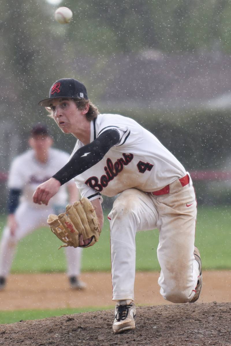 Bradley-Bourbonnais' Eric Rainbolt throws a pitch as rain falls during a home game against Lincoln-Way West Thursday, May 1, 2025.
