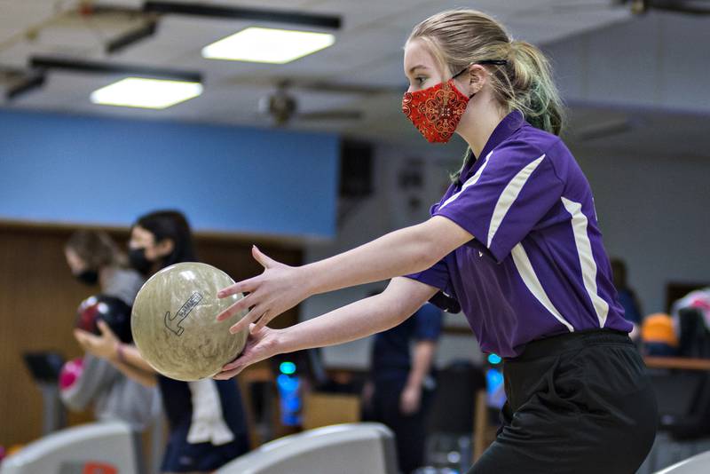 Dixon's Autumn Swift makes her first throw of the night against Sterling at Plum Hollow on Monday, Jan. 10, 2022.