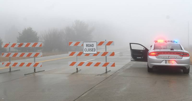 Illinois Route 2 was closed between Camling and E. Townline roads Sunday morning following a serious auto accident. Here, an Ogle County squad car sits next to the barricades at E. Patricia Road, near the Irwin Acres subdivision, seven miles north of Oregon. Heavy fog blanketed the area in the morning hours.