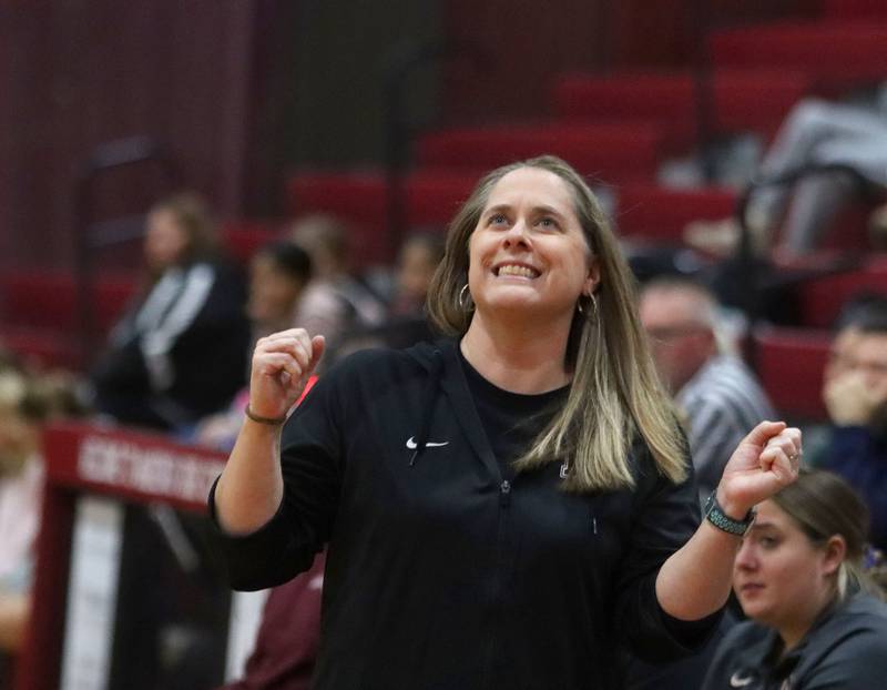 Marengo’s Head Coach Elisa Hanson reacts as the Indians build a lead against Woodstock North in varsity girls basketball on Tuesday, Dec. 2, 2025, at Marengo High School in Marengo.