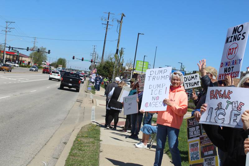 Over 100 people attended the "Communities Not Cages" protest hosted by Indivisible McHenry County on April 25, 2026, in McHenry.