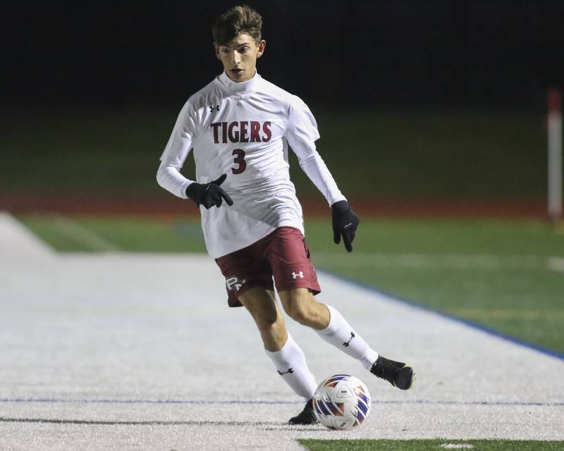 Plainfield North's Dylan Dwyer (3) passes the ball off to a teammate during Class 3A Naperville Central Regional semifinal soccer match between Plainfield North at Oswego, Tuesday Oct 21, 2025.