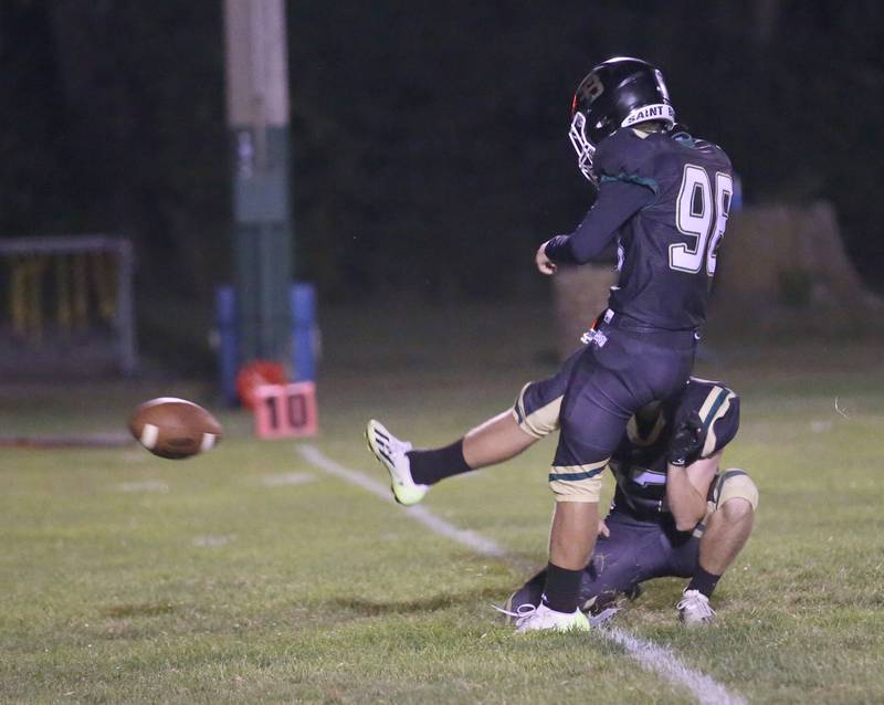 St. Bede's place kicker Ryan Soliman kicks an extra point after scoring the teams first touchdown against Ridgewood on Friday, Sept. 15, 2023 at St. Bede Academy.