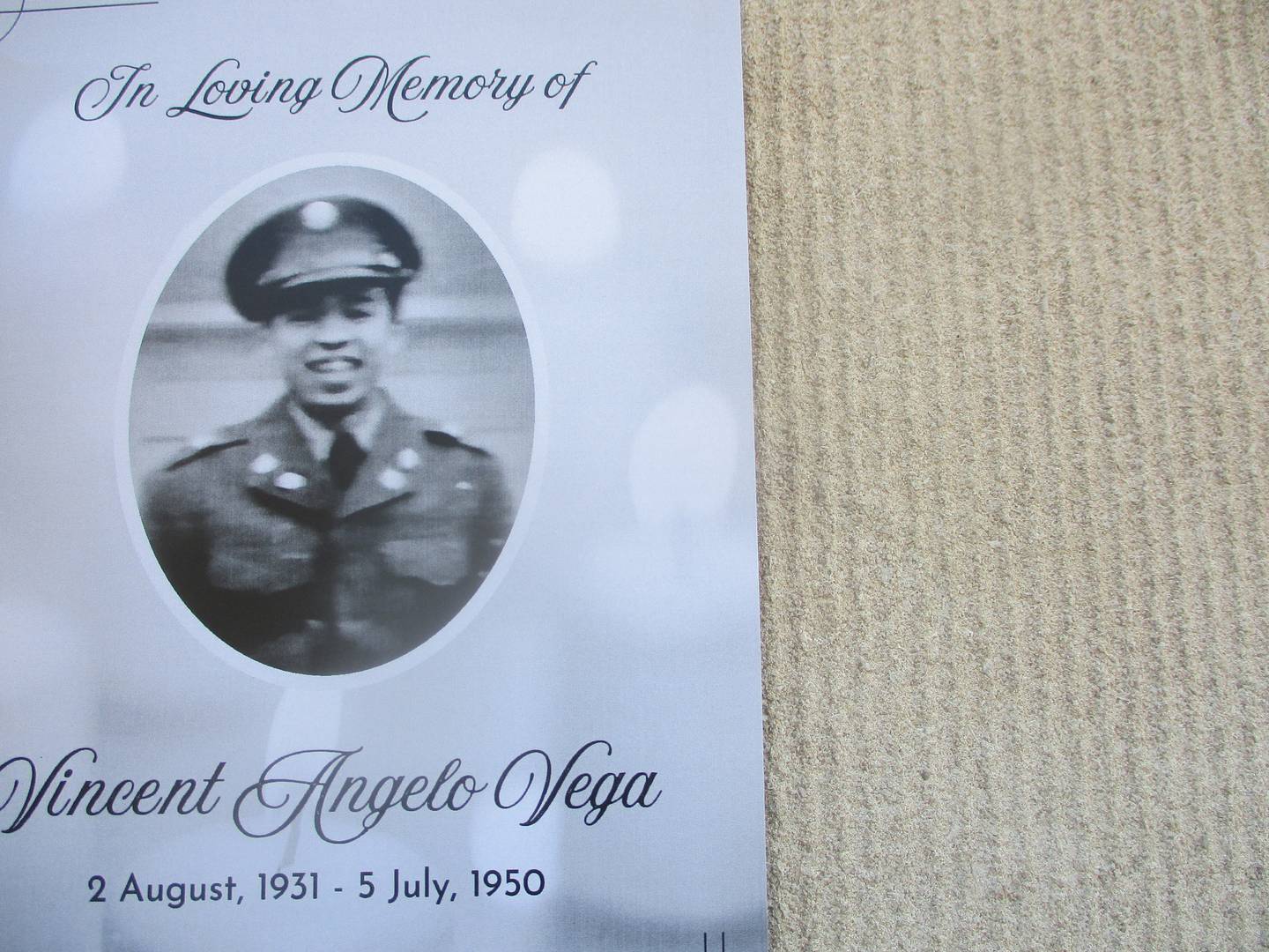 A program for Vincent Vega's funeral includes a photograph of him when he joined the Army to fight in the Korean War. Oct. 3, 2025