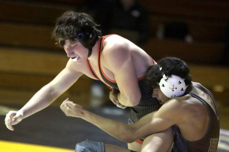 Jacobs’ Connor Zacarias, right, battles Crystal Lake Central’s Dominic Vitale at 157 pounds in varsity wrestling on Thursday, Jan. 16, 2025, at Jacobs High School in Algonquin.