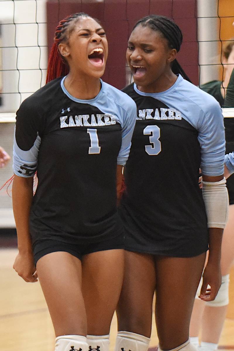 Kankakee's Ki'Asia Wilson, left, and Erin Wills celebrate a point during a home All-City game against Bishop McNamara Wednesday, Sept. 3, 2025.