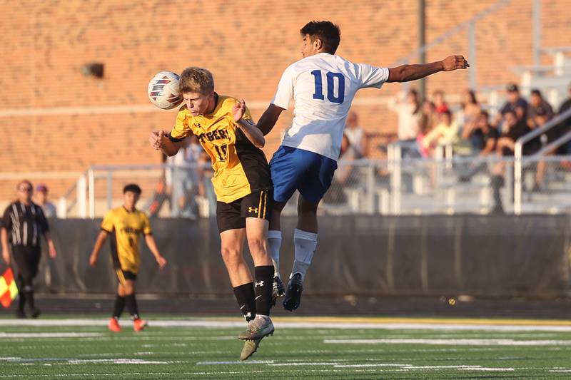 Joliet West’s Ethan Podmolik gets to the ball before Joliet Central’s Javier Contreras on Tuesday, Oct. 3, 2023 in Joliet.