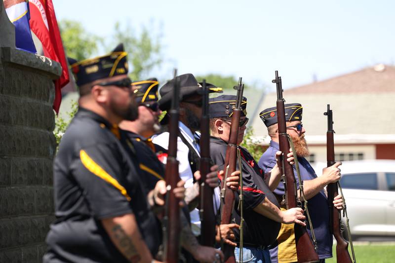 Members of the Bradley American Legion stand at attention as "Taps" is played during the Legion's Memorial Day ceremony on Monday, May 25, 2026.