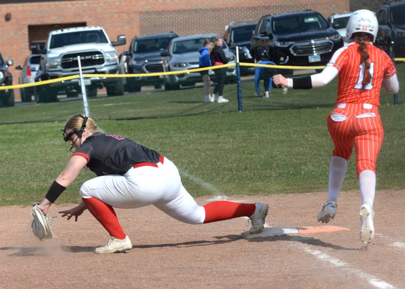 Fulton first basemn Kylie Smither stretches to make the catch for an out against Milledgeville at the Pearl City Tournament on Saturday, April 12, 2025.