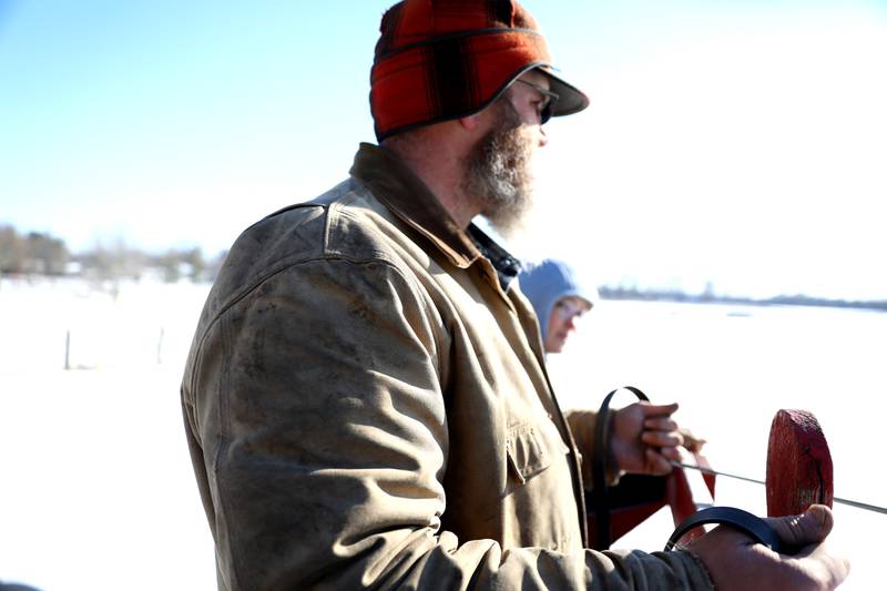 Matt Dehnart, historical farming program specialist, leads the horse-drawn bob sled through Kline Creek Farm in West Chicago. The farm offers its Farmlife in Winter program Thursdays through Mondays.