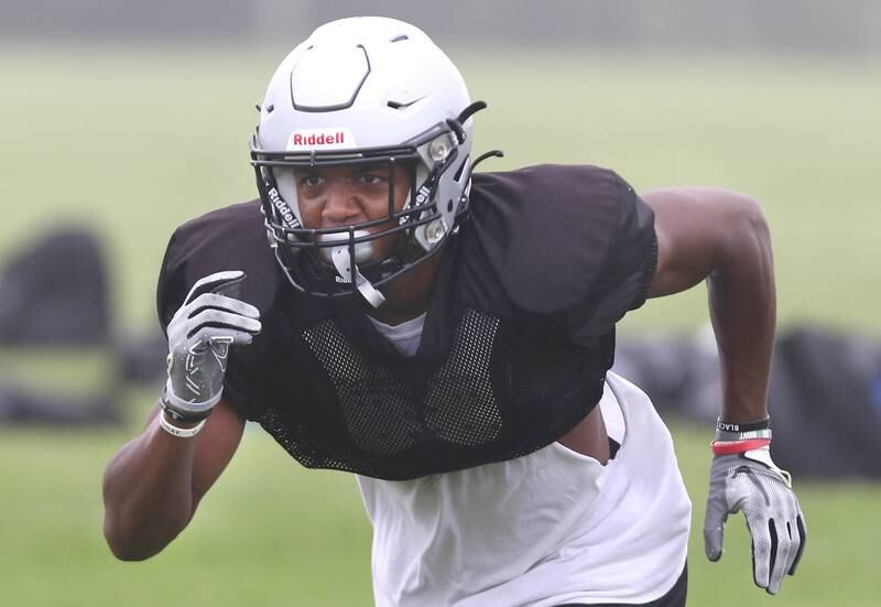Kaneland’s Aric Johnson heads out on a route during practice Wednesday, Aug. 9, 2023, at the school in Maple Park.