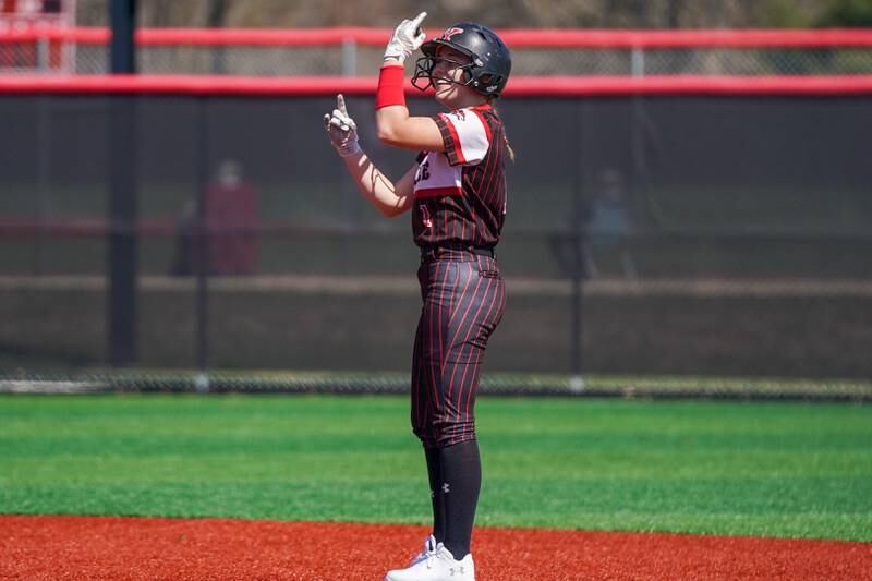 Yorkville's Johanna Pavlak celebrates after hitting a double against Antioch during a nonconference softball game at Yorkville High School on Saturday, April 12, 2025.