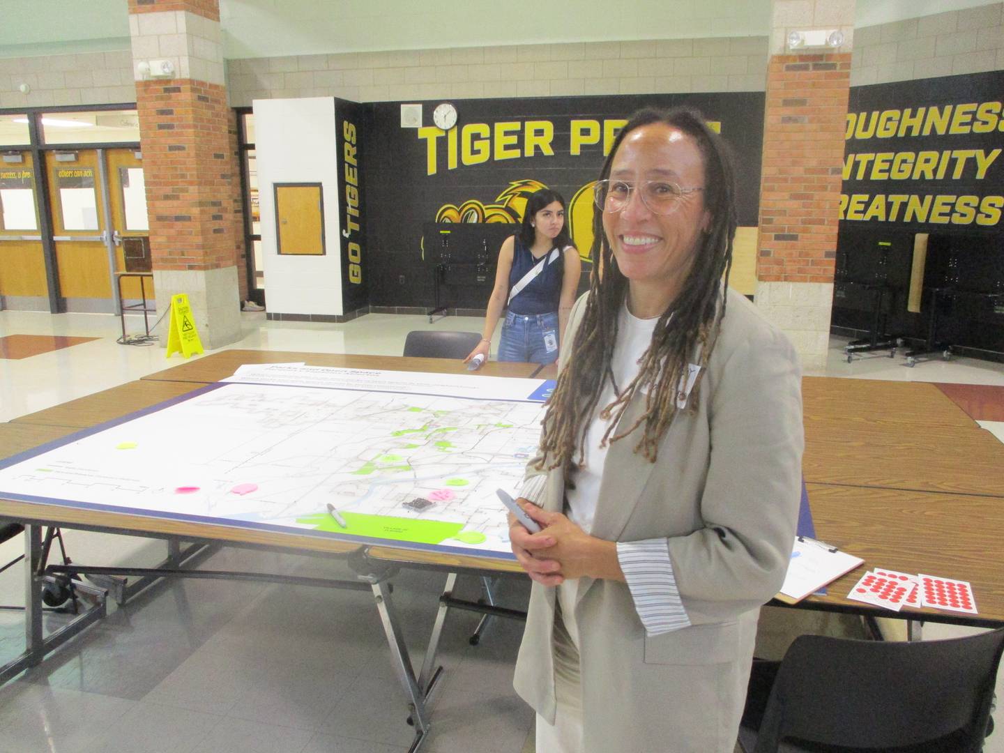 Lesley Roth, a principle with Lamar Johnson Collaborative, the firm developing a comprehensive plan for Joliet, was among those collecting information at a public workshop on Wednesday at Joliet West High School. Sept. 17, 2025