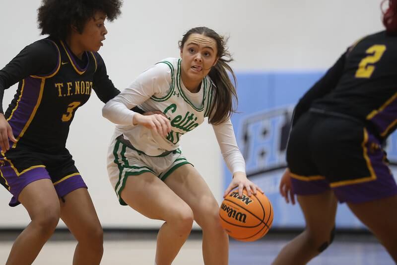 Providence’s Liv Anderson works the ball against Thornton Fractional North in the Class 3A Hillcrest Sectional semifinal game on Tuesday, Feb. 24, 2026 in Hillcrest.