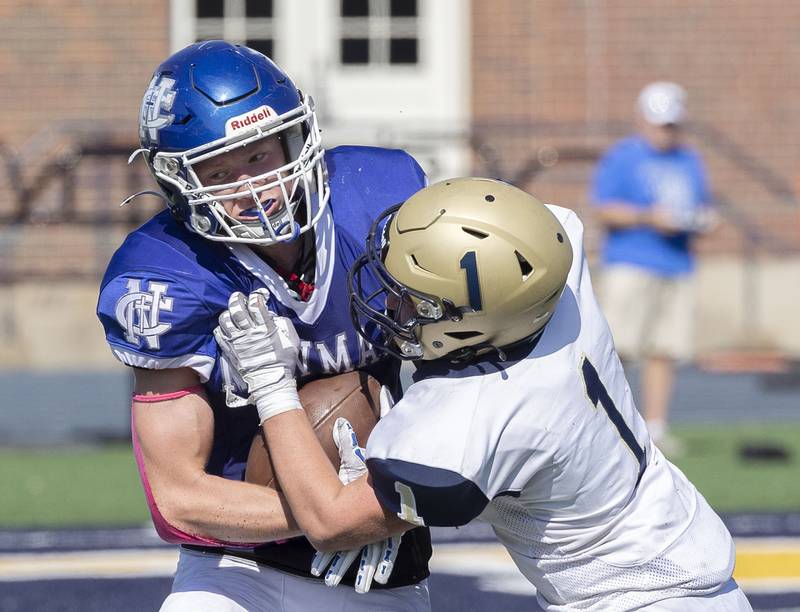 Newman’s George Jungerman is shoved out of bounds by Mercer County’s Logan Schreurs Saturday, October 4, 2025.