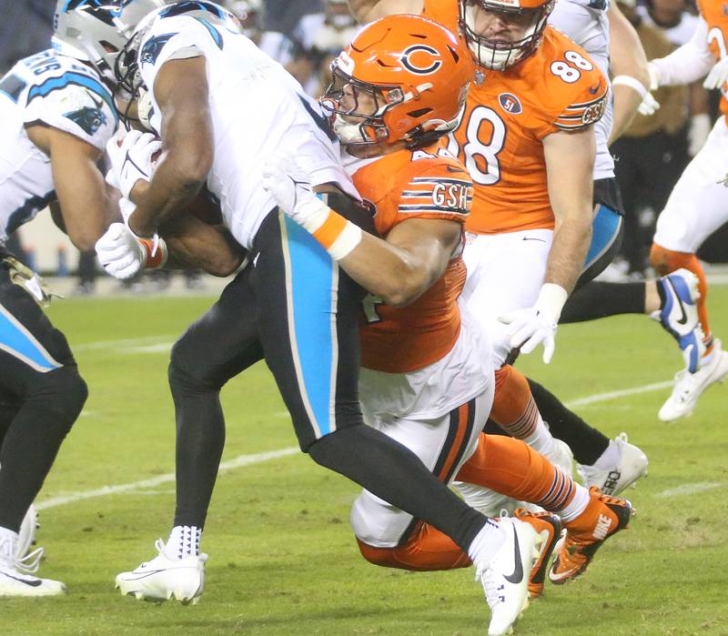 Chicago Bears line backer Noah Sewell brings down Carolina Panthers running back Raheem Blackshear on Thursday, Nov. 9, 2023 at Soldier Field.