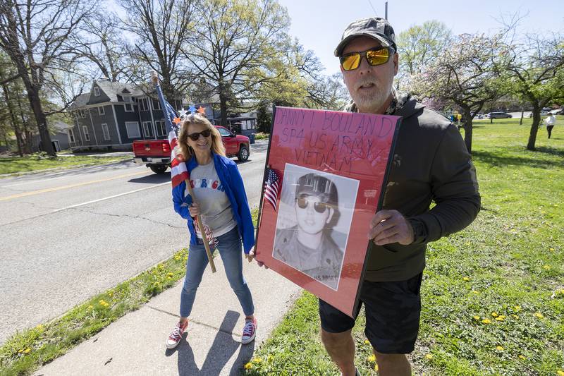 Steve Bouland of Rochelle displays a photo of his brother, Danny T. Bouland, on Saturday, April, 26, 2025, in Dixon. Danny served in Vietnam and died at age 42 from the effects of Agent Orange. Steve and Cindy Sambdman wanted to honor his legacy by attending the Vietnam veteran parade in Dixon.