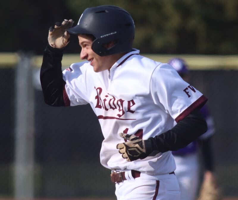 Prairie Ridge’s Ryan Myers trots back to the dugout after flying out against Hampshire in varsity baseball on Wednesday, April 16, 2025, at Prairie Ridge High School in Crystal Lake.
