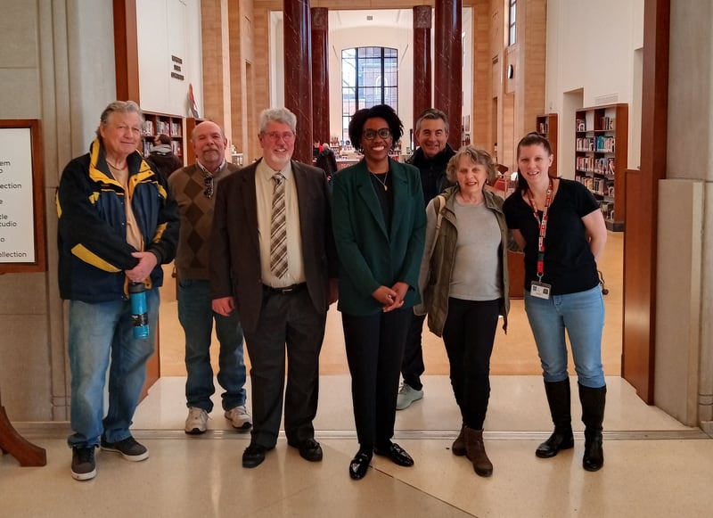 U.S. Rep. Lauren Underwood, D-Naperville, (third from right, front row) poses with constituents who joined her Saturday, March 23, 2023,  at the DeKalb Public Library, 309 Oak St., to celebrate the 14th anniversary of the Affordable Care Act.
