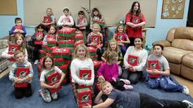 Sandwich church program members fill Christmas boxes