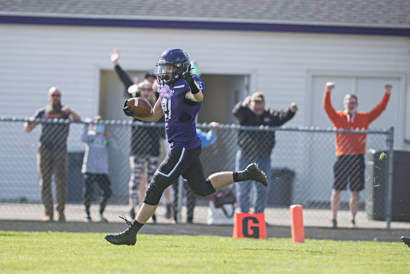 Dixon's Hunter Gehrt crosses the goalline for a late game TD that put the Dukes ahead for good.