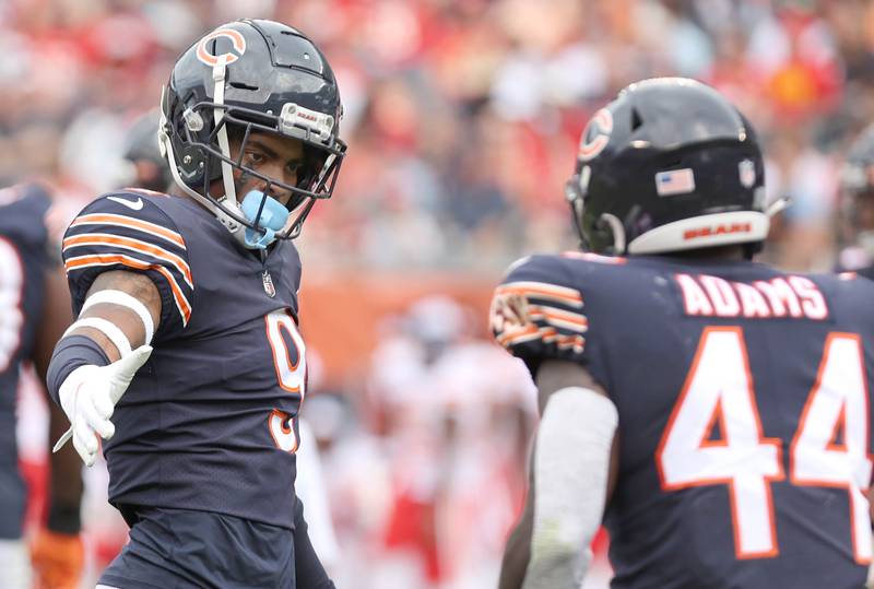 Chicago Bears defensive back Jaquan Brisker (left) and linebacker Mattew Adams react after a play Sunday, Aug. 13, 2022, during their game against the Chiefs at Soldier Field in Chicago.