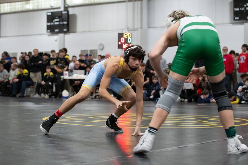 Ottawa's Wesley Janick, left, and Seneca's Raiden Terry wrestle in the 120-pound championship match during the Reed-Custer Comet Classic Wrestling Invite on Saturday, Jan 17.