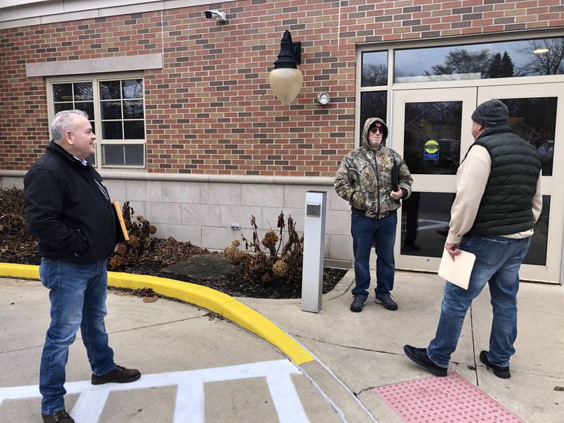 Rick O'Sadnick, Dave Waldorf and Tom Payton line up outside Peru City Hall to file for candidacy as aldermen in the upcoming election on Monday, Dec. 12, 2022