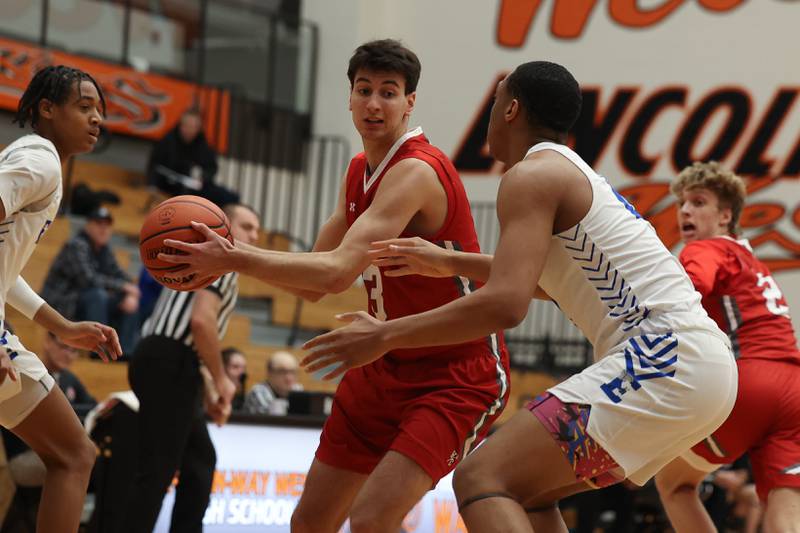 Hinsdale Central’s Emerson Eck looks for a play against Lincoln-Way East in the Lincoln-Way West Warrior Showdown on Saturday January 28th, 2023.