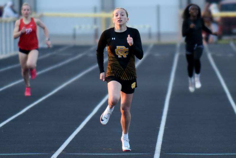 Reed-Custer's Isabella Dixon leads the pack to the finish line of the 400 meters at the Herscher Invite Friday, May 1, 2026.