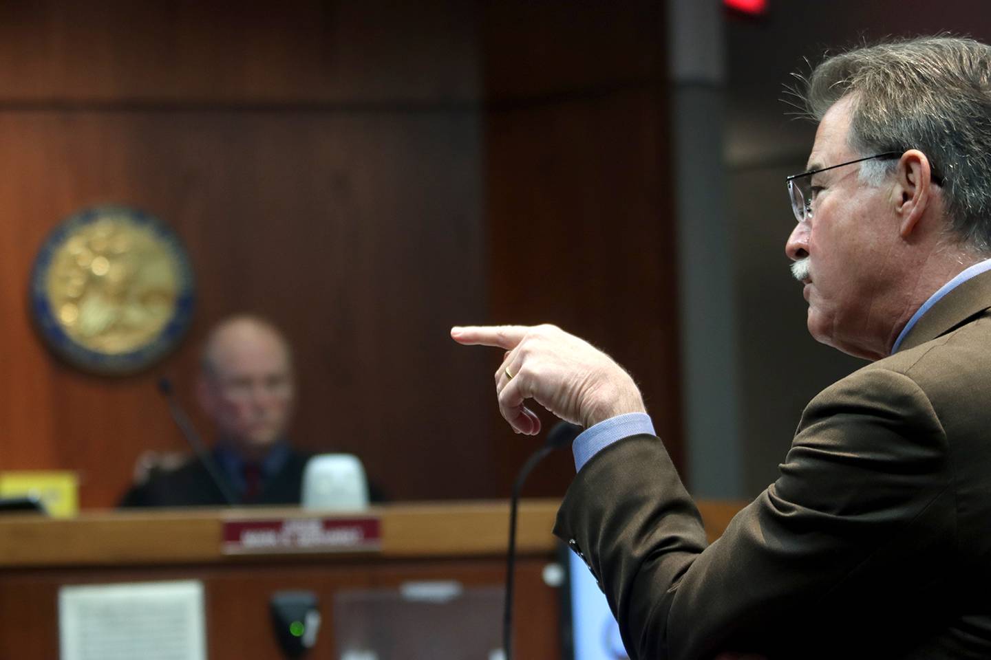 Defense attorney Phil Prossnitz examines witness John O. Miller during a hearing for defendants Colin Scott and Michael Penkava Thursday, Dec. 16, 2021, at the Michael J. Sullivan Judicial Center in Woodstock.