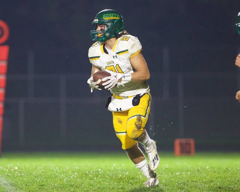 Crystal Lake South's Michael Prokos looks for room to run against Cary - Grove on Friday, Oct. 13 2023 in Cary Grove.