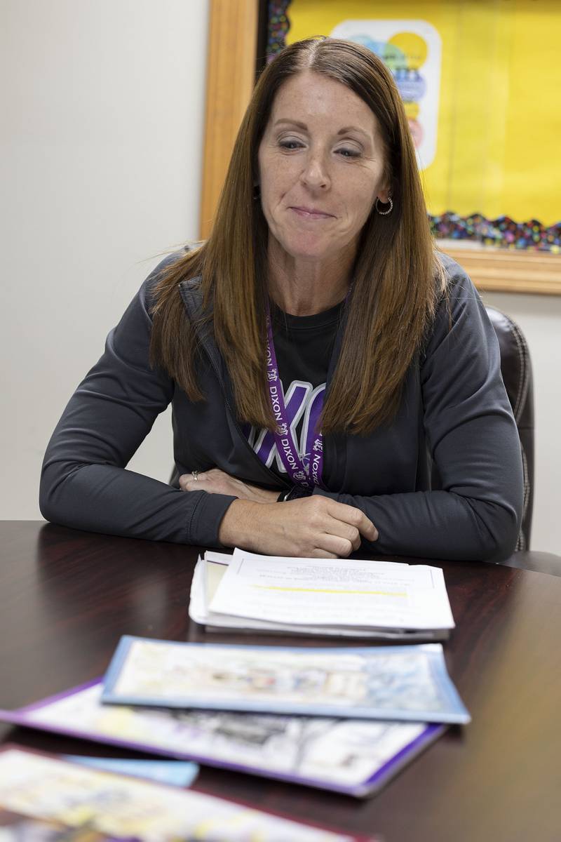 Madison School teacher Melissa Guthrie talks about the yearly Young Authors book the school puts together Tuesday, Oct. 21, 2025. Students submit written and artistic works which are then chosen by a class of high school students for inclusion in the book.