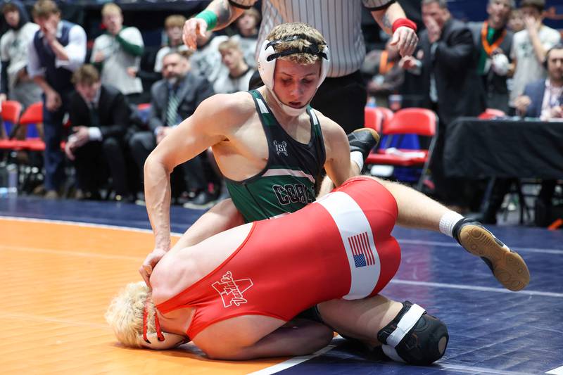 Coal City's Luke Munsterman wrestles Vandalia's Brody Matthews in the 138-pound match during the Coalers' victory in the IHSA Class 1A Dual Team State championship on Saturday, Feb. 28, 2026.