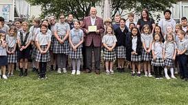 Sycamore Catholic school honors former employee