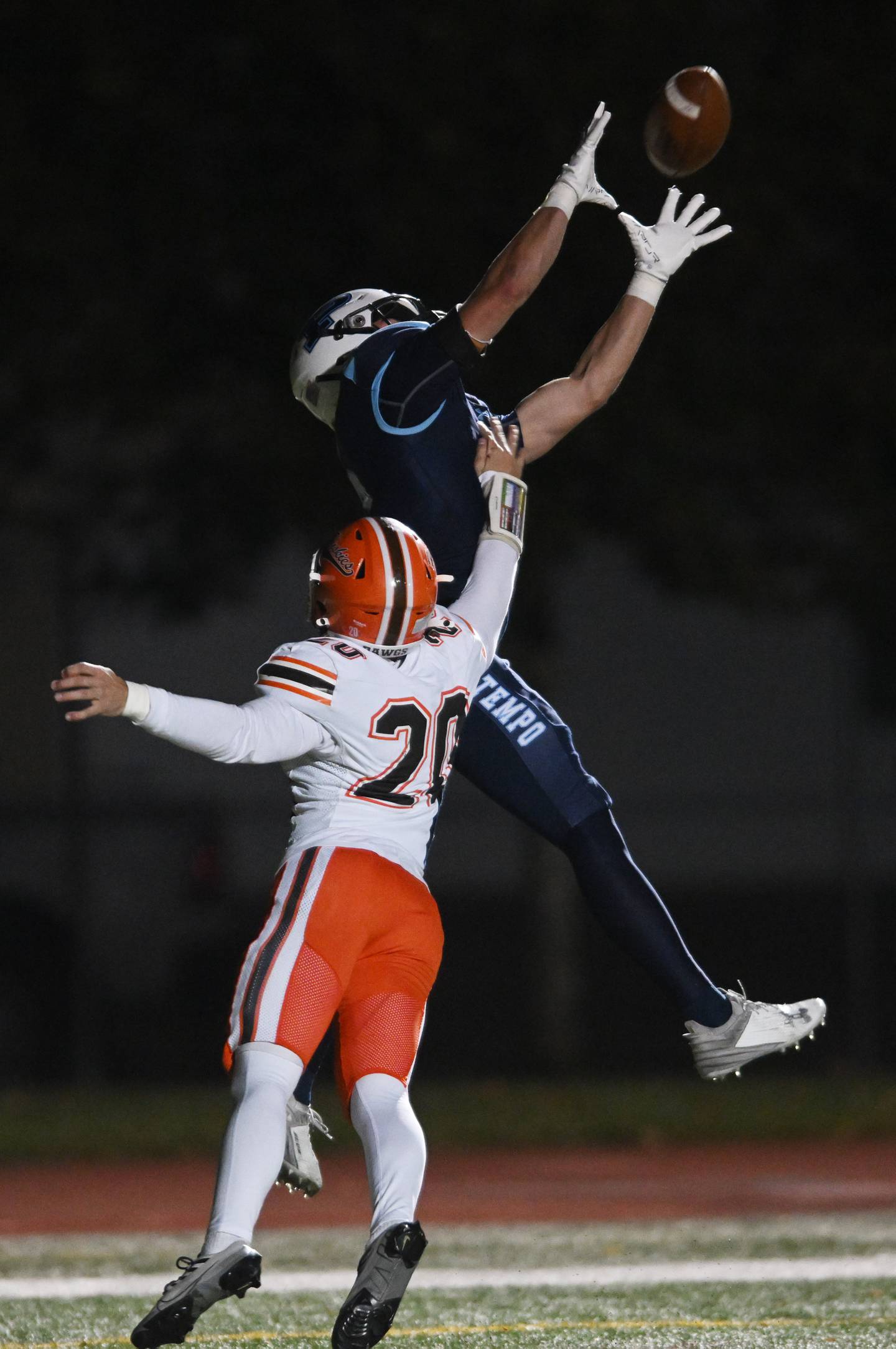Prospect’s Nick Carlucci catches a touchdown pass in front of Hersey’s Luke Koclanis during a class 7A first-round football playoff game on Friday, Nov. 1, 2024 in Mount Prospect.