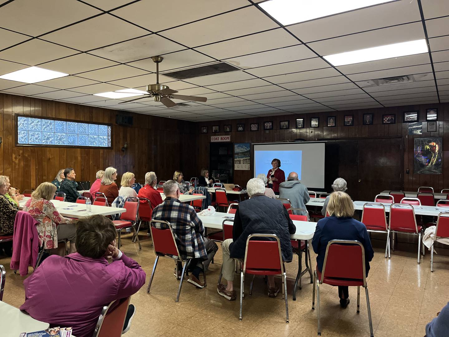 Members of the public listen to presentation by the League of Women Voters in Illinois on how to identify misinformation and disinformation and their impact on elections at the Joliet Croatian Cultural Club Wednesday, Oct. 16, 2024.