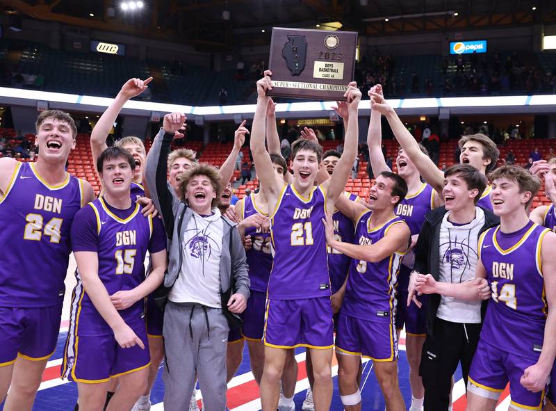 Downers Grove North celebrates their victory against Kenwood Academy in Chicago on Monday, March 6, 2023.