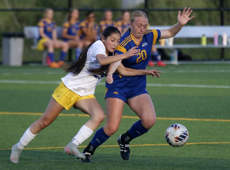 Johnsburg's Kayla Hiller (right) battles with Cristo Rey St. Martin's Zaory Munoz for control of the ball during an IHSA Class 1A Cristo Rey St. Martin Sectional semifinal girls soccer match on Tuesday, May 26, 2026 at Cristo Rey St. Martin College Prep, in Waukegan.