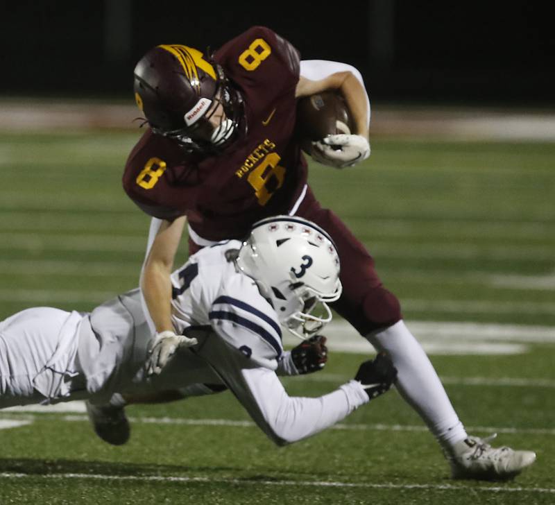 St. Viator's Driese Raap tackles Richmond-Burton's Jack Martens during a IHSA Class 4A first round playoff football game Friday, Oct. 27, 2023, at Richmond-Burton High School in Richmond.