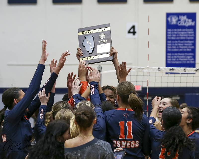 Oswego celebrates their victory over Neuqua Valley in their Class 4A Regional Final volleyball match between Neuqua Valley at Oswego. Oct 30, 2025 in Plainfield.