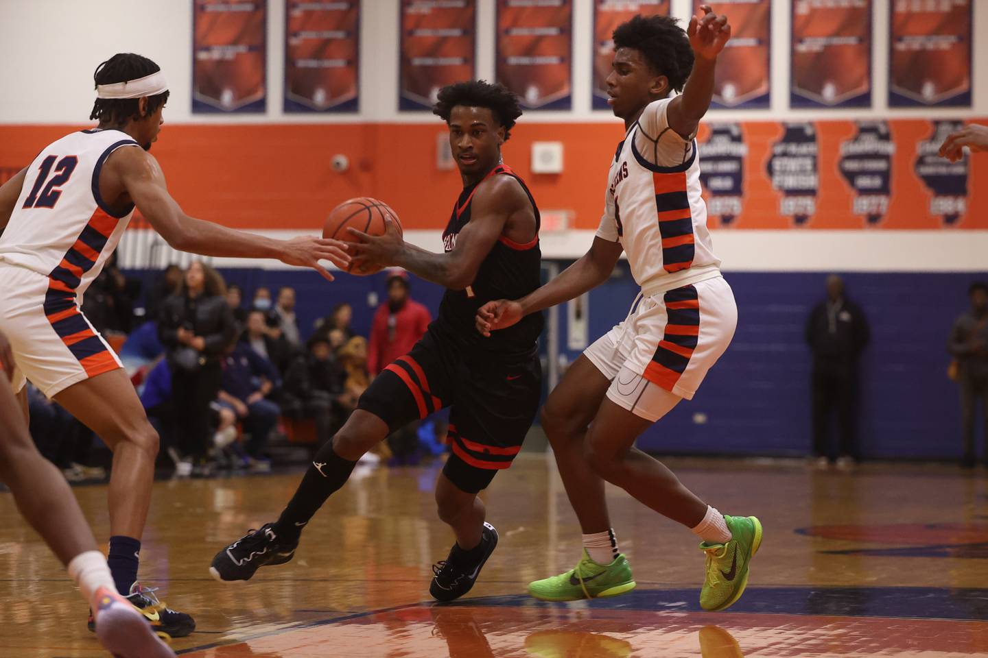 Bolingbrook’s Mekhi Cooper drives to the basket against Romeoville.