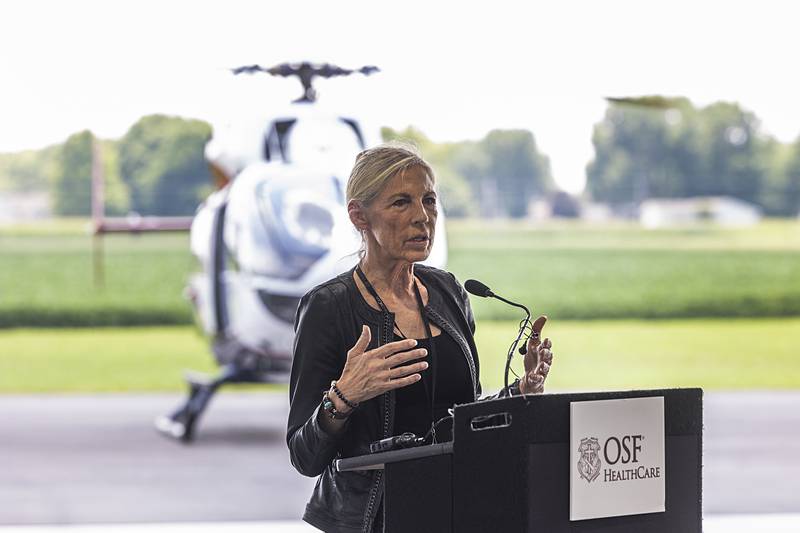 Kathy Devin, VP of OSF Aviation, tells a little about the history of the Life Flight program Wednesday, July 10, 2024 during an open house of the newest hangar at the Whiteside County Airport in Rock Falls.