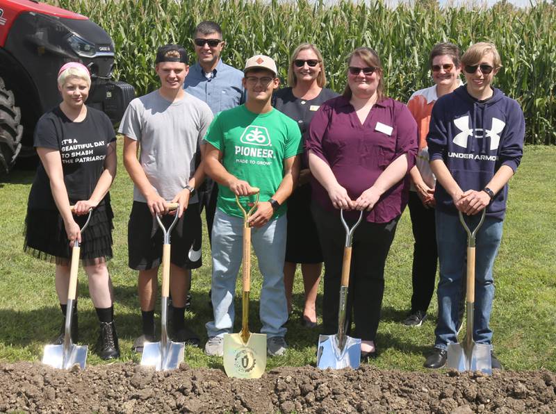 Students of the Illinois Valley Community College Agriculture program pose for a photo during a groundbreaking ceremony of the new Dr. Alfred E. Wisgoski  Agricultural Education on Friday, Aug. 22, 2025 at Illinois Valley Community College in Oglesby. The new building, received a one-million dollar donation from the Wisgoski family, funds from the federal Economic Development Administration and the state of Illinois Department of Commerce and Economic Opportunity, will not only provide physical spaces that reflect the program’s growth, innovation, and capabilities, but the IVCC Agricultural Education Center will also serve as a focal point for agricultural industry activities within the community. The building will take one-year to complete.