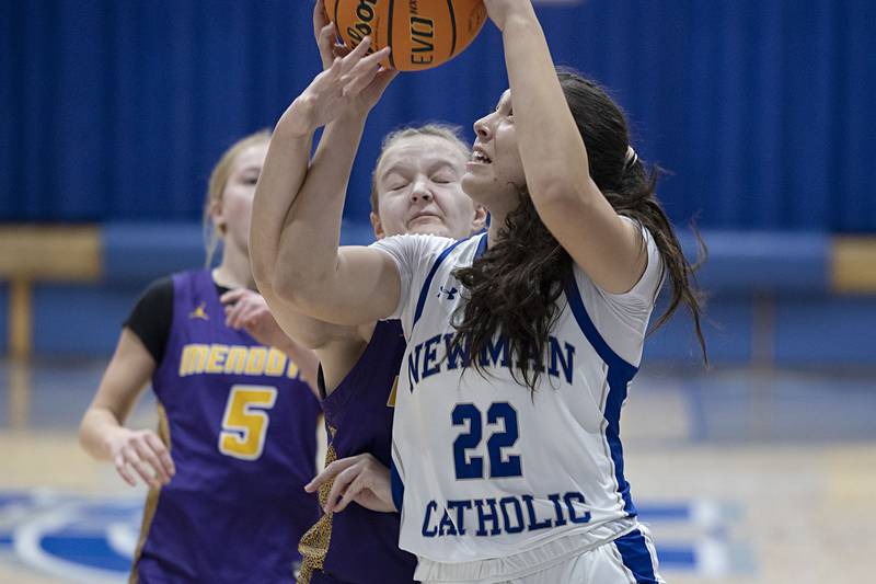 Newman’s Anna Propheter puts up a shot against Mendota Thursday, Dec. 4, 2025.