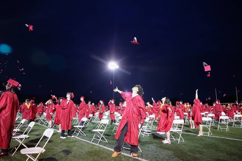 Kyron Birk throws his hat in celebration at the conclusion of the Bradley-Bourbonnais Community High School commencement ceremony on Thursday, May 21, 2026. Birk is competing in the IHSA State Track meet this weekend in two relays with fellow seniors LyZale Edmon and Jordan Fitch.