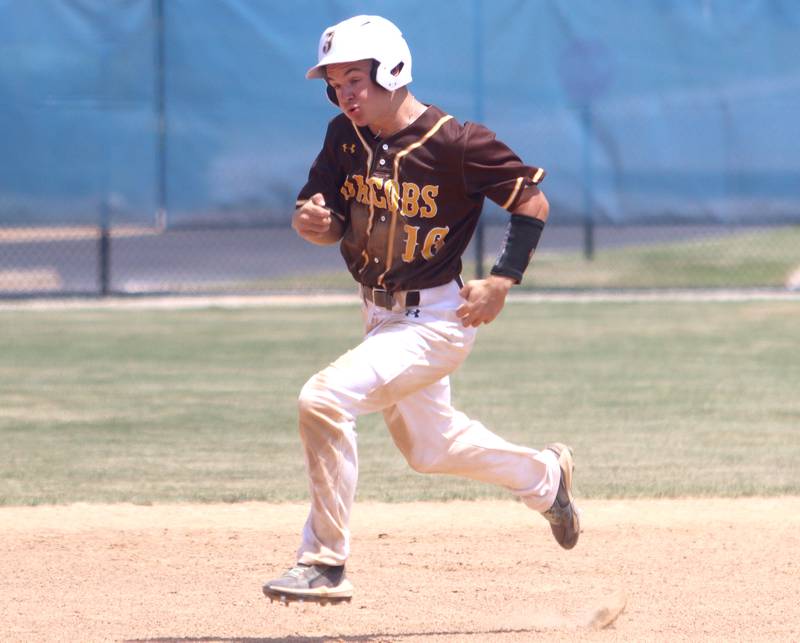 Jacobs’ Nathan Martinko runs the bases against Hononegah in Class 4A Sectional baseball action at Carpentersville Saturday.