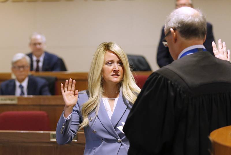 McHenry County Auditor Shannon Teresi takes the oath of office from Chief Judge Michael Feetterer on Monday, Dec. 2, 2024, at the McHenry County Administration Building in Woodstock.