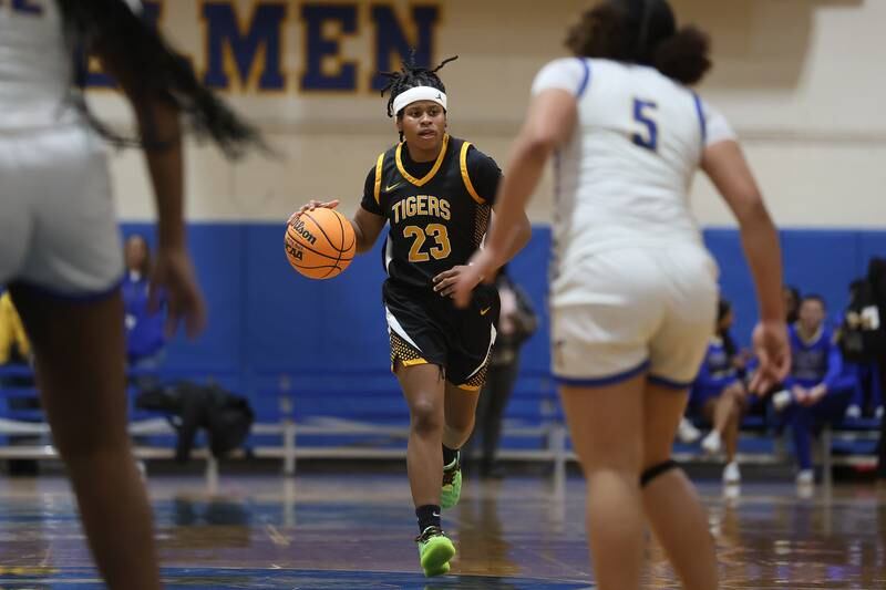 Joliet West’s Keniya Foster works the ball up court against Joliet Central on Thursday, Jan. 15, 2026 in Joliet.